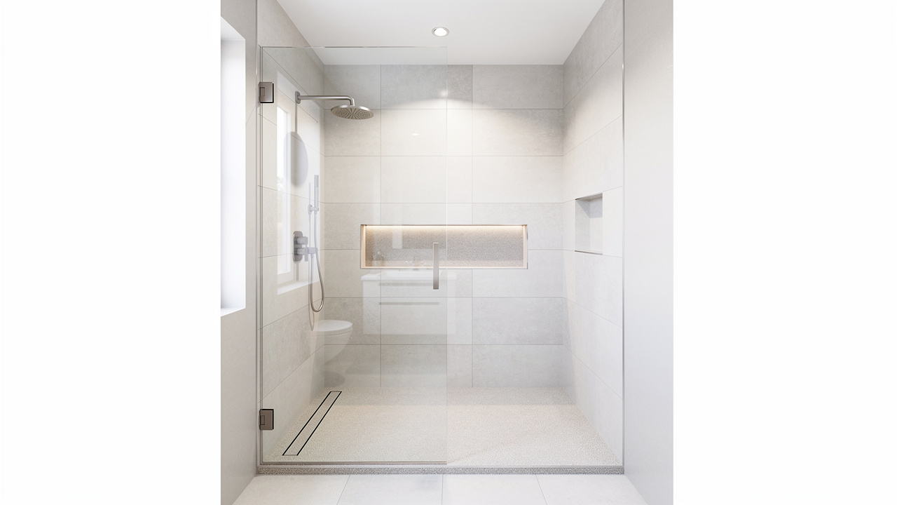 Vue large d’une petite salle de bains moderne avec douche à l’italienne, paroi vitrée, carrelage clair, niche murale et sol antidérapant.